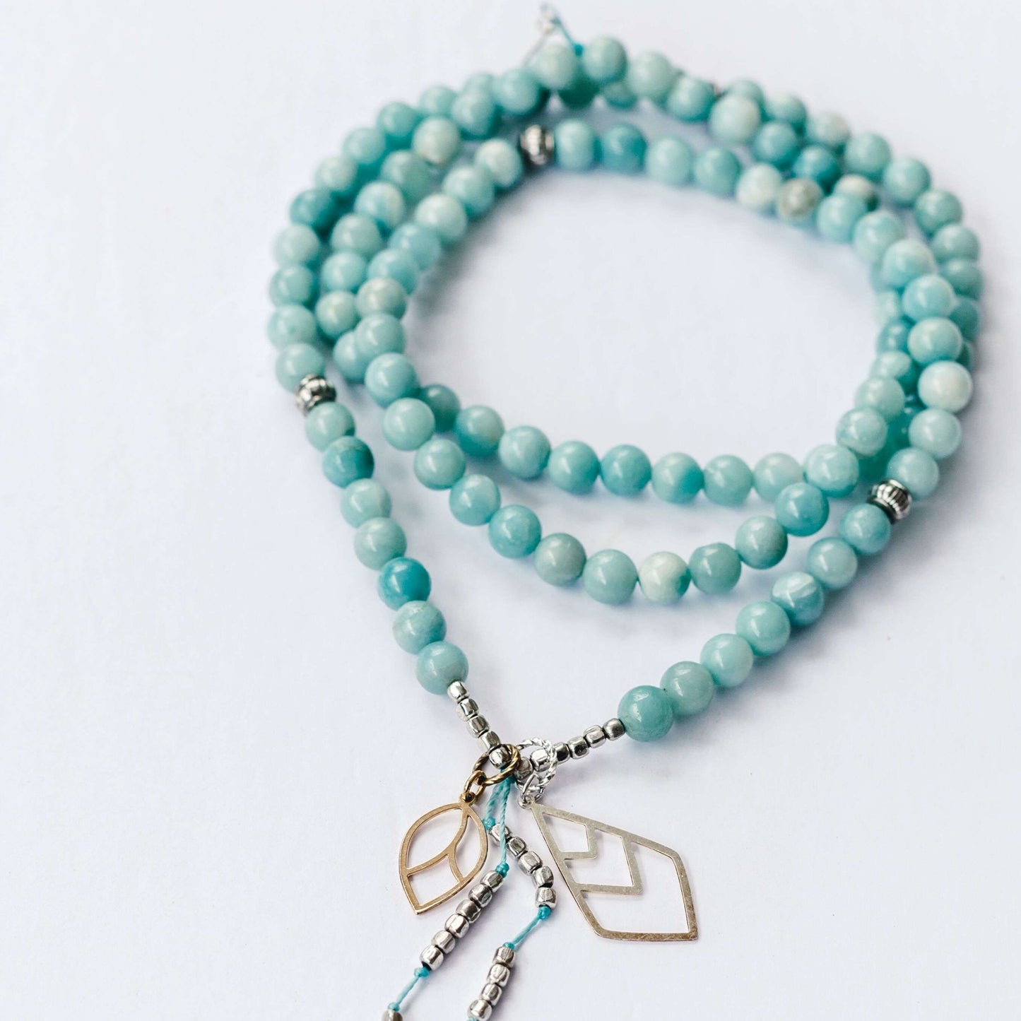 Freedom Mala - Mala & Me- Gemstones with beautiful geometric pendents inspired by nature- Jewlery used for meditation, setting intentions and enhancing your yoga practice. Each gemstone holds unique healing properties