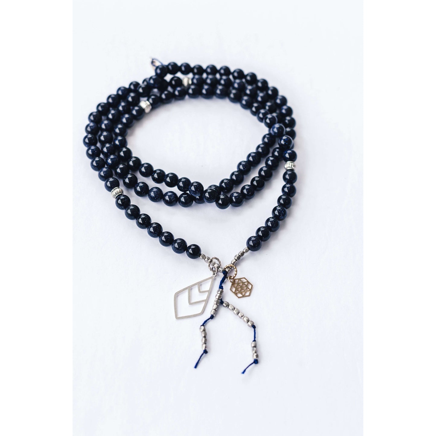 Courageous Mala - Mala & Me- Gemstones with beautiful geometric pendents inspired by nature- Jewlery used for meditation, setting intentions and enhancing your yoga practice. Each gemstone holds unique healing properties