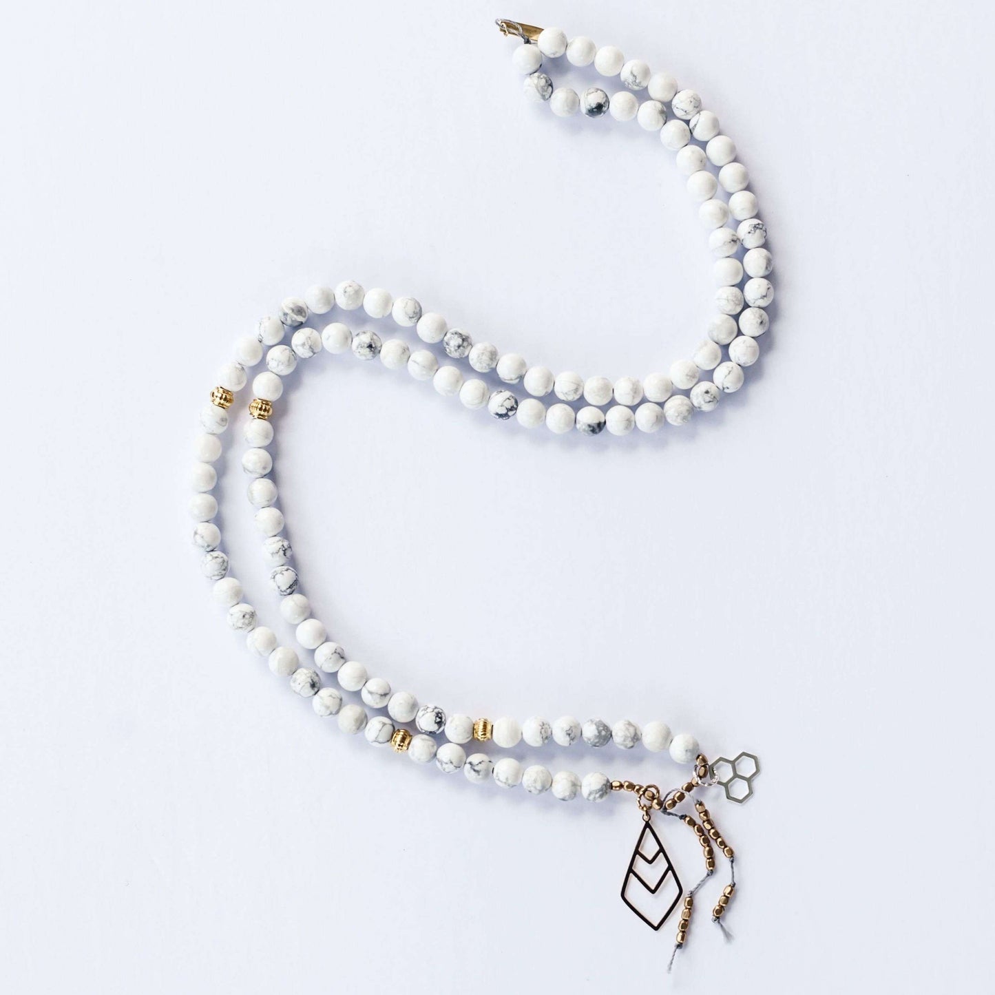 Hakuna Matata Mala - Mala & Me- Gemstones with beautiful geometric pendents inspired by nature- Jewlery used for meditation, setting intentions and enhancing your yoga practice. Each gemstone holds unique healing properties