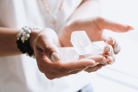 quartz gemstone in hands